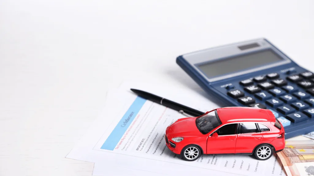 Calculator and car keys representing the cost of motor tax in Ireland