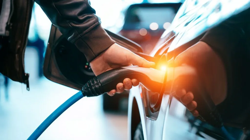 Electric car charging at a home wallbox charger in Ireland